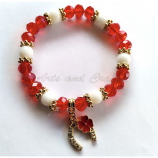 Bracelet for March 1 - horseshoe model with red clover